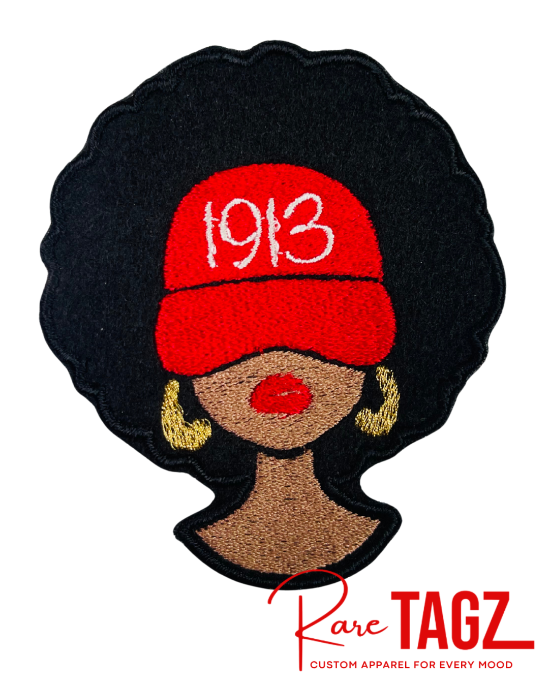 Embroidered patch of a woman wearing a red '1913' cap with 'Rare TAGZ' branding.