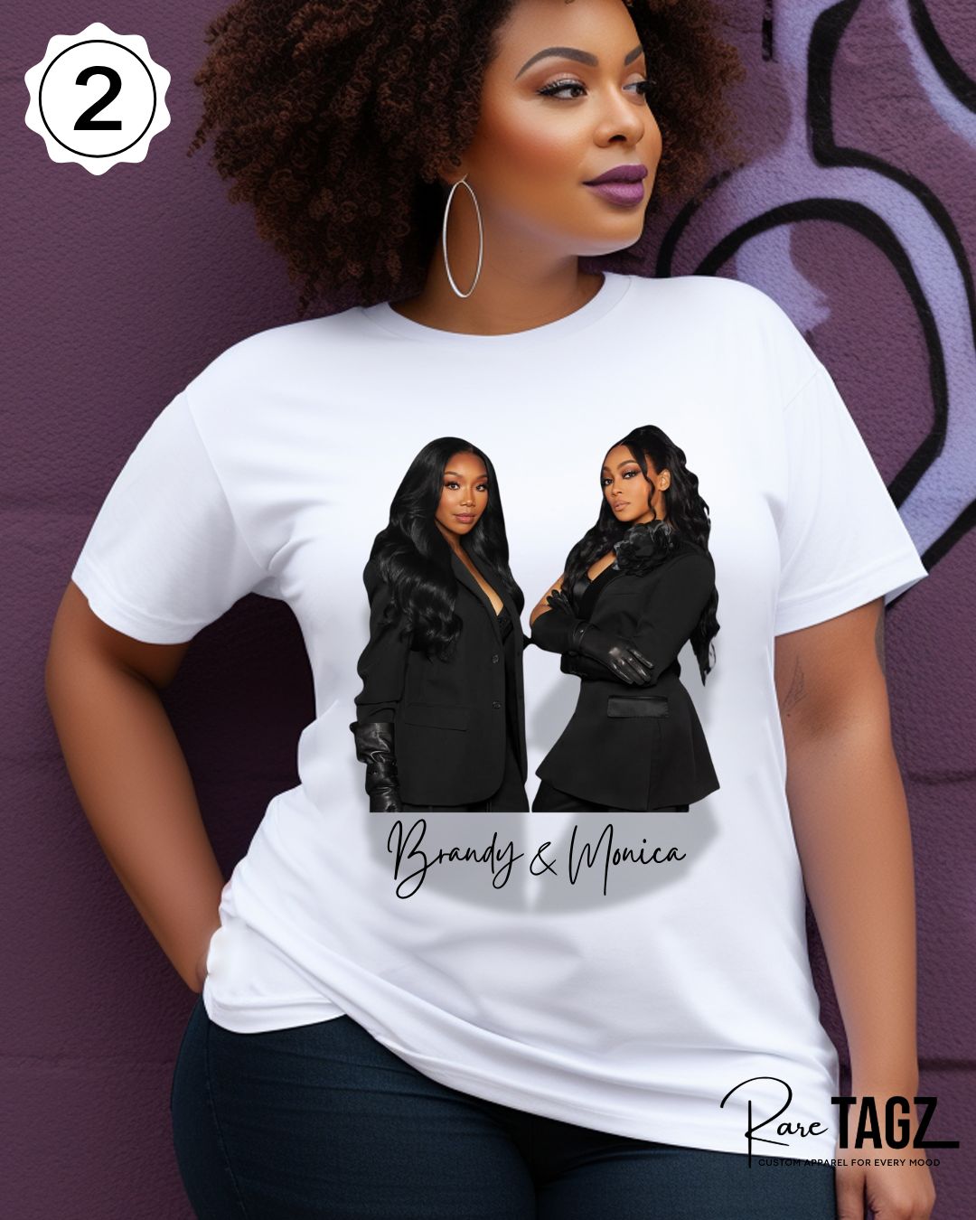 Woman wearing a white t-shirt with graphic design of Brandy and Monica and text that reads The Boy is Mine. Promoting the Boy is Mine Tour.