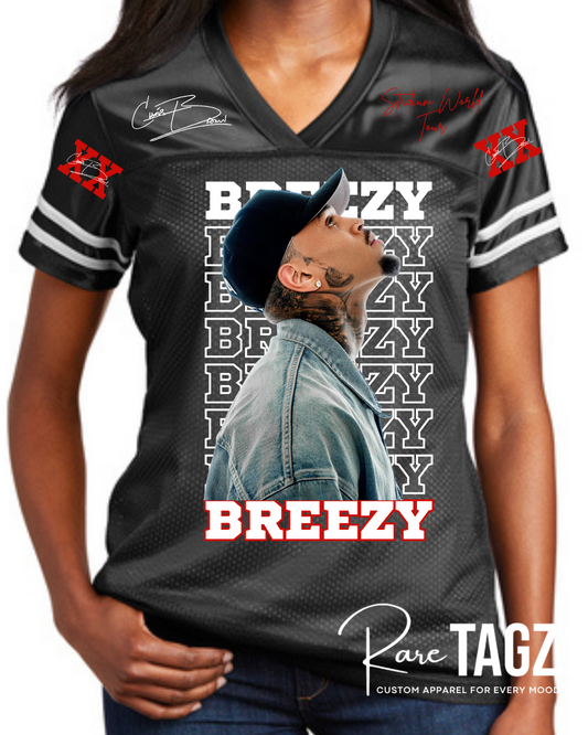 Black sports jersey with 'Breezy' branding and a person wearing it.
