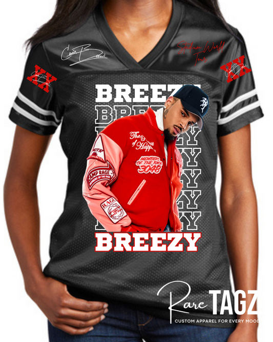 Black sports jersey with a graphic of a person wearing a red jacket and 'Breezy' text, on a white background. Breezy bowl Jersey