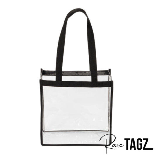 Transparent clear tote bag with black trim and long handles, suitable for stadium and event use. Clear Bags, Stadium Approved, Clear Tote Bags, Football Games, Concert Venues