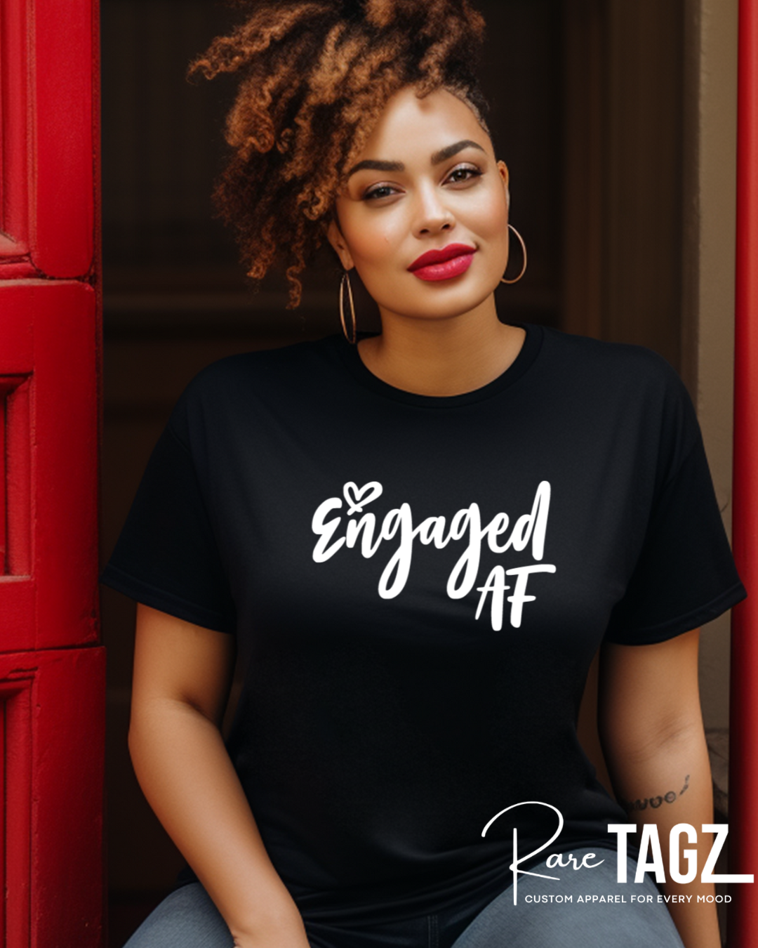 Engaged AF black t-shirt with white lettering, modeled by woman with curly hair custom apparel by Rare Tagz.
Bachelorette t-shirt, bride-to-be t-shirt, bachelorette, bridal shower, fiance, wedding, wedding gifts