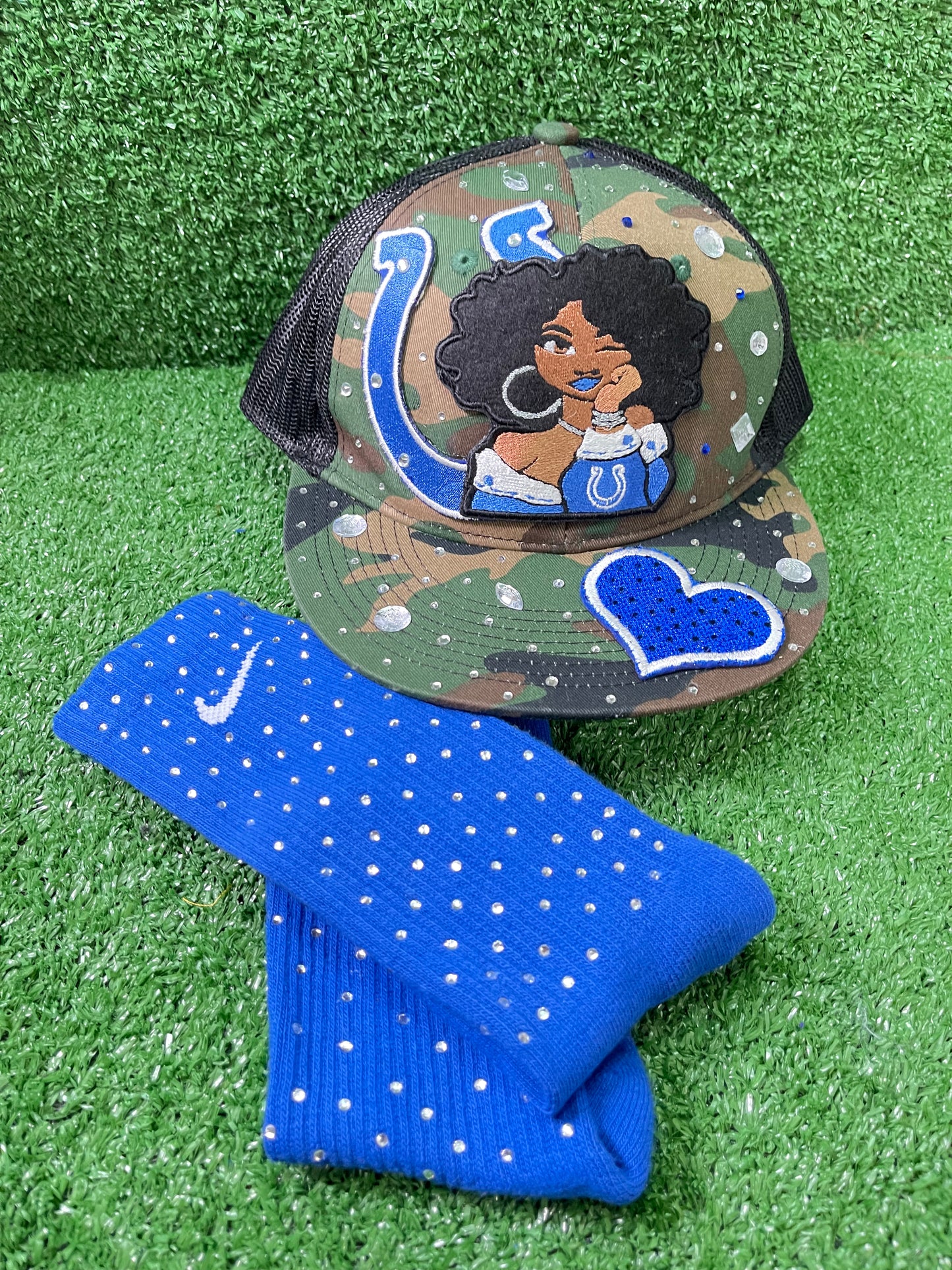 Blue Nike socks embellished with sparkling rhinestones, adding a touch of bling and style.  The socks feature a bold blue color with rhinestones carefully placed for a dazzling effect, perfect for elevating any sneaker look.