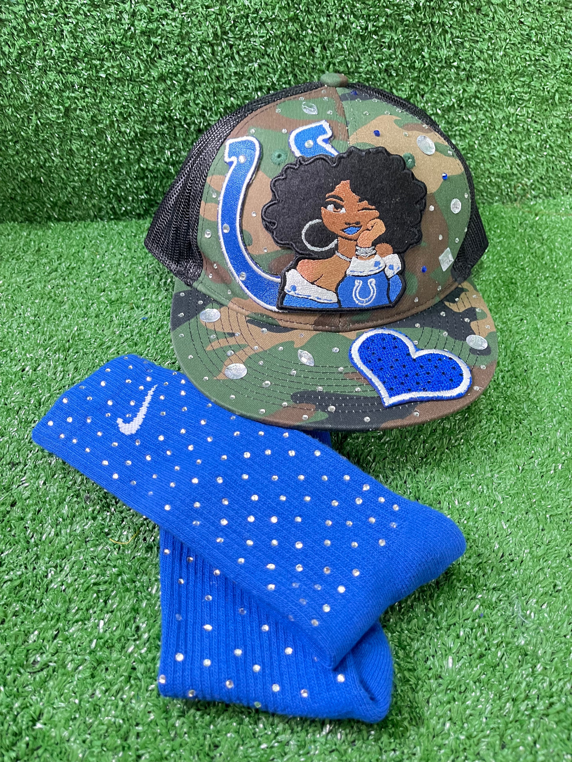 Blue Nike socks embellished with sparkling rhinestones, adding a touch of bling and style.  The socks feature a bold blue color with rhinestones carefully placed for a dazzling effect, perfect for elevating any sneaker look.