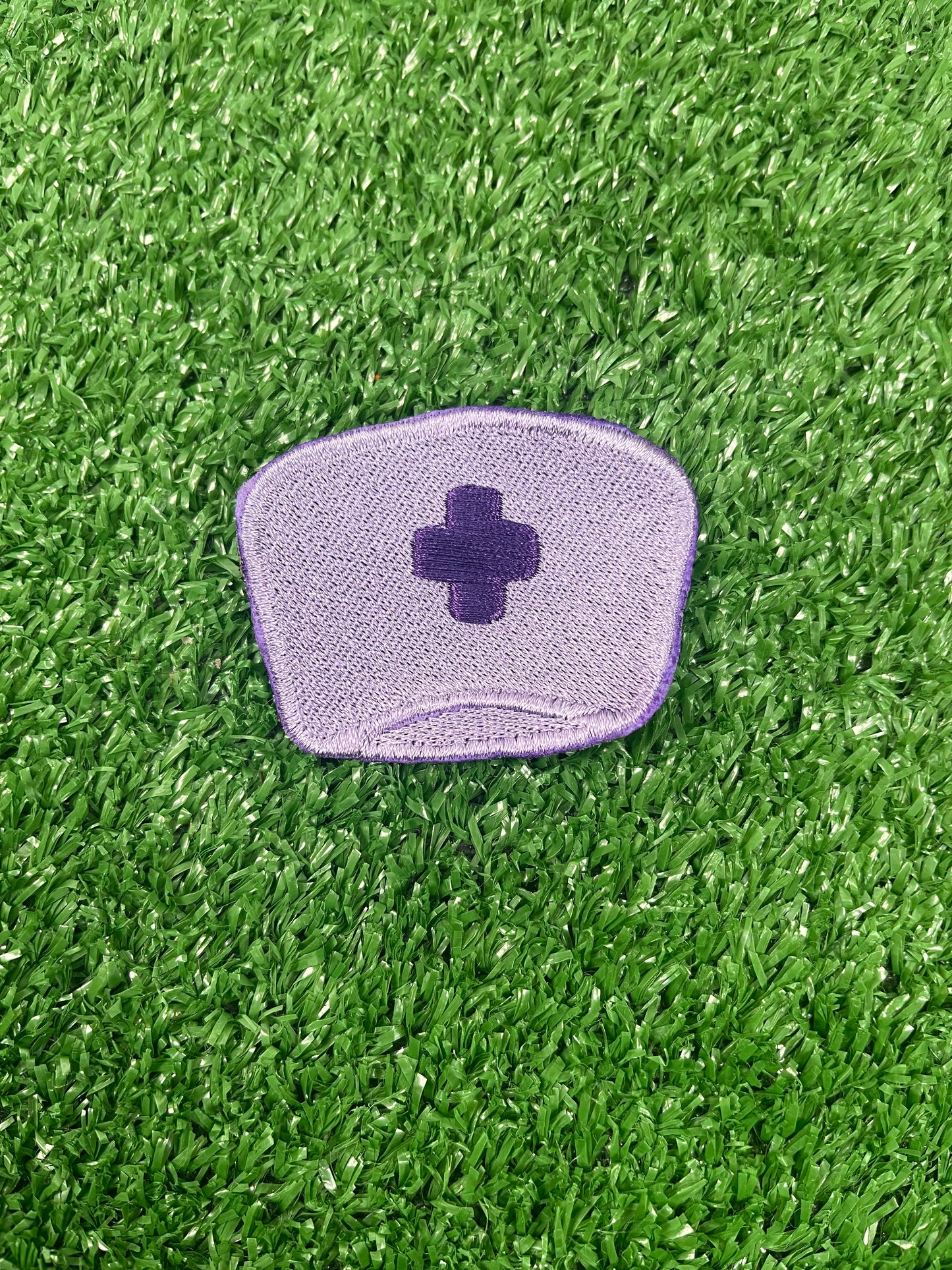 Purple nurse-themed embroidered iron-on patch set featuring six designs: 
Cool Nurse Club
A Proud Nurse
Nurse Fuel Coffee Cup
Nurse Cap 
Butterfly with Nurse script
Nurses Call the Shots phrase