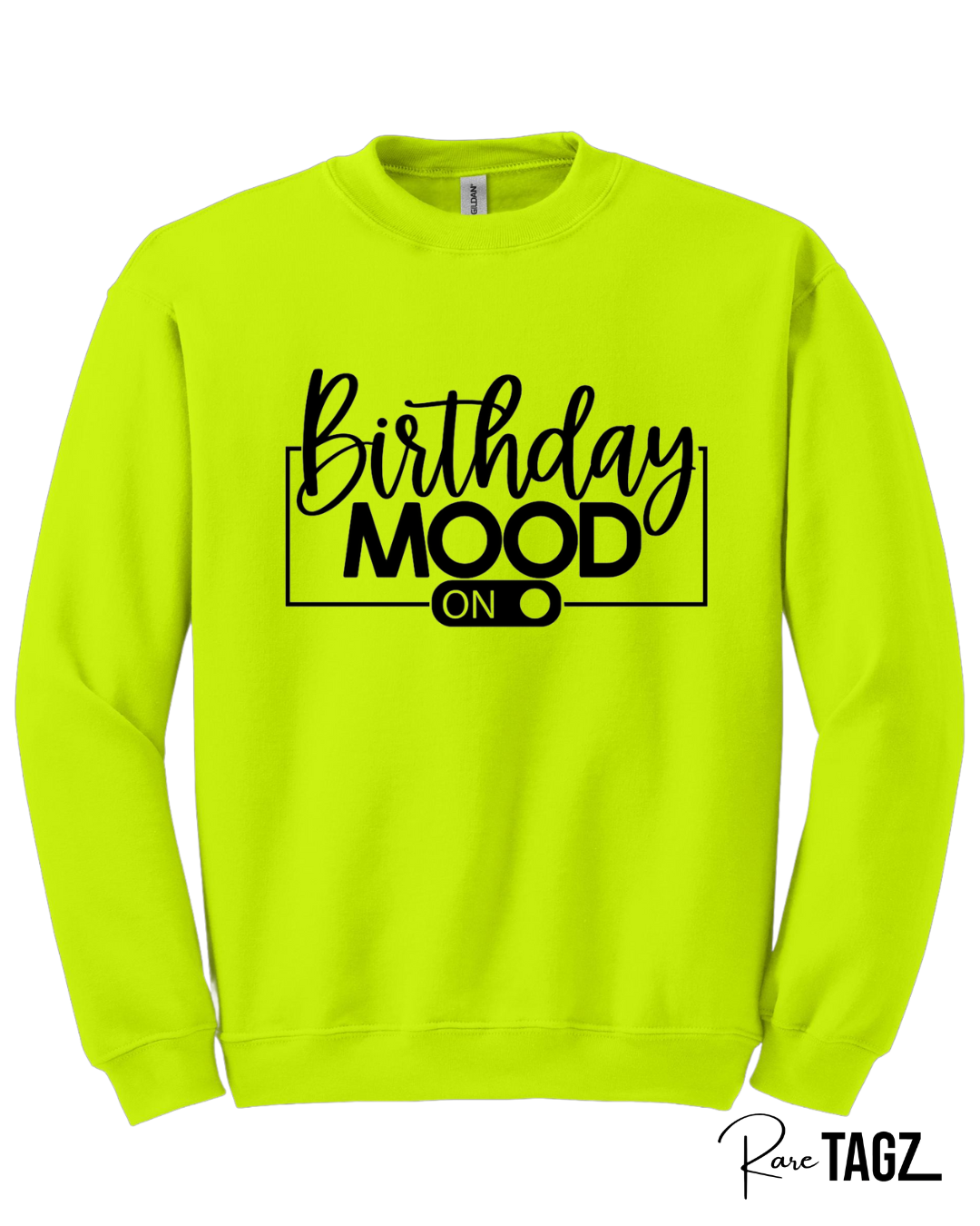 Bold green crewneck sweatshirt featuring the phrase Birthday Mood On in stylish black lettering with an on-switch graphic. This cozy and festive birthday sweatshirt by Rare Tagz is perfect for birthday celebrations, photo ops, and turning up your birthday energy in style.