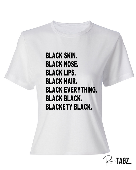 White t-shirt with bold black text that reads Black Skin Black Nose Black Lips Black Hair Black Everything Black Black Blackety Black Designed By Rare Tagz