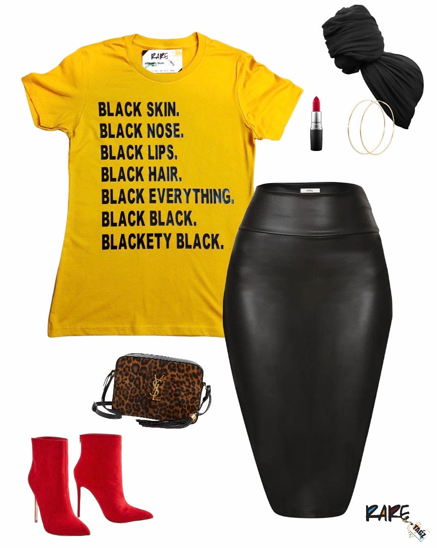 Gold t-shirt with bold black text that reads Black Skin Black Nose Black Lips Black Hair Black Everything Black Black Blackety Black Designed By Rare Tagz