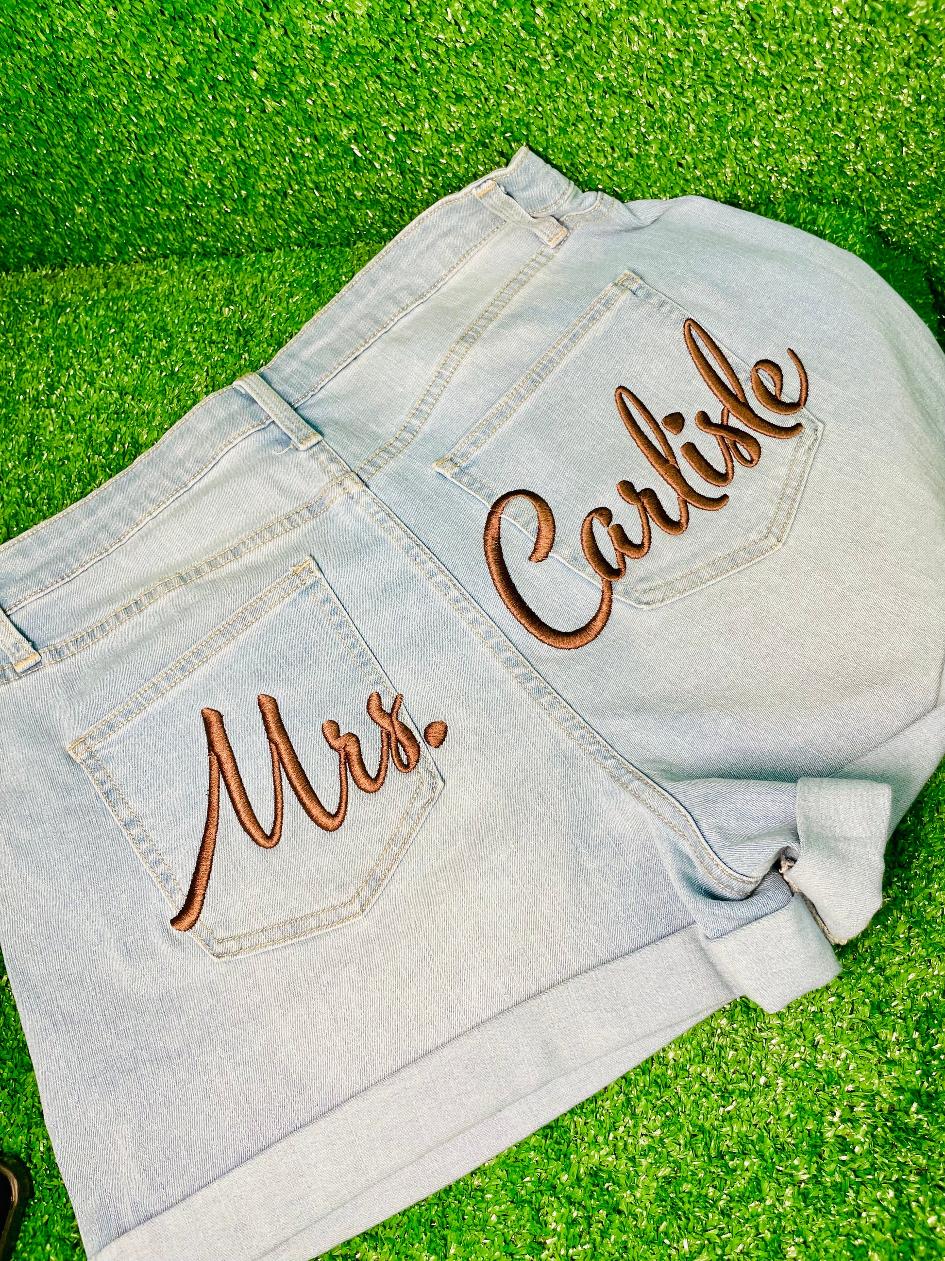 Custom denim shorts with custom embroidery on the back, perfect for birthdays, baecations, wedding, girls trips, and special events.