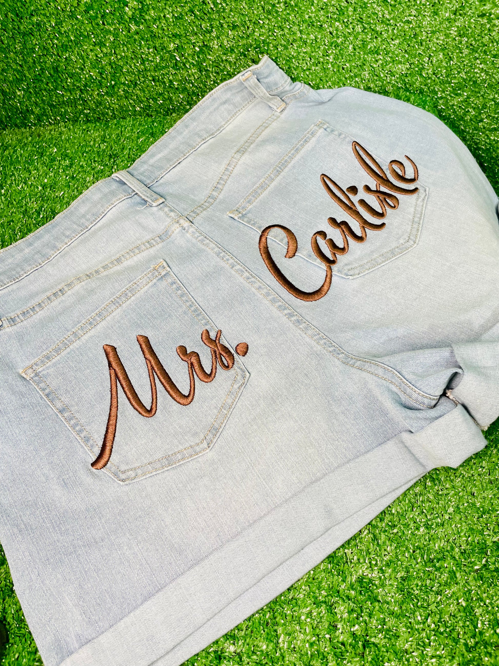 Custom denim shorts with custom embroidery on the back, perfect for birthdays, baecations, wedding, girls trips, and special events. Newly engaged, fiancé, bride to be, wedding planning. Bridal showers, engagement party