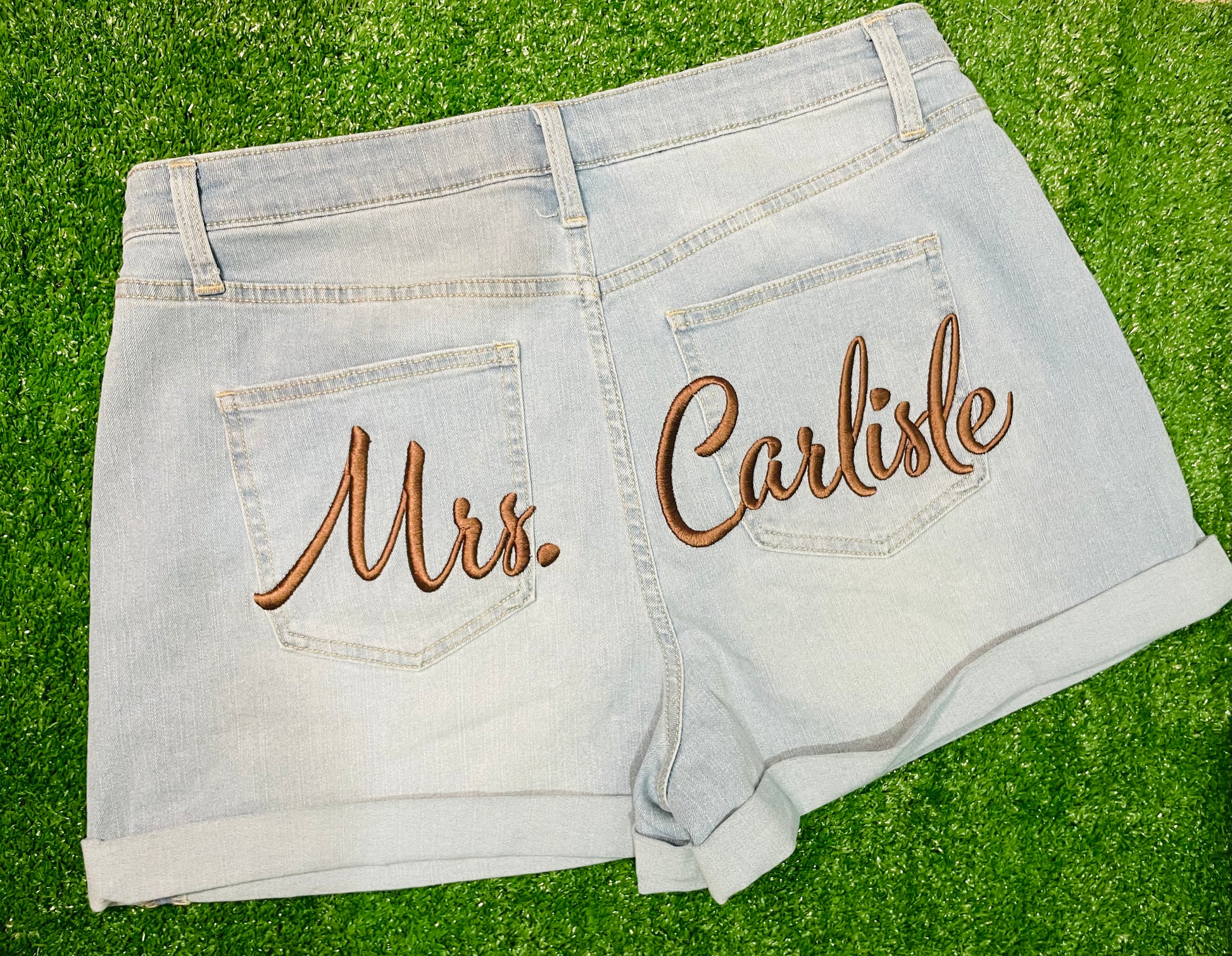 Custom denim shorts with custom embroidery on the back, perfect for birthdays, baecations, wedding, girls trips, and special events.