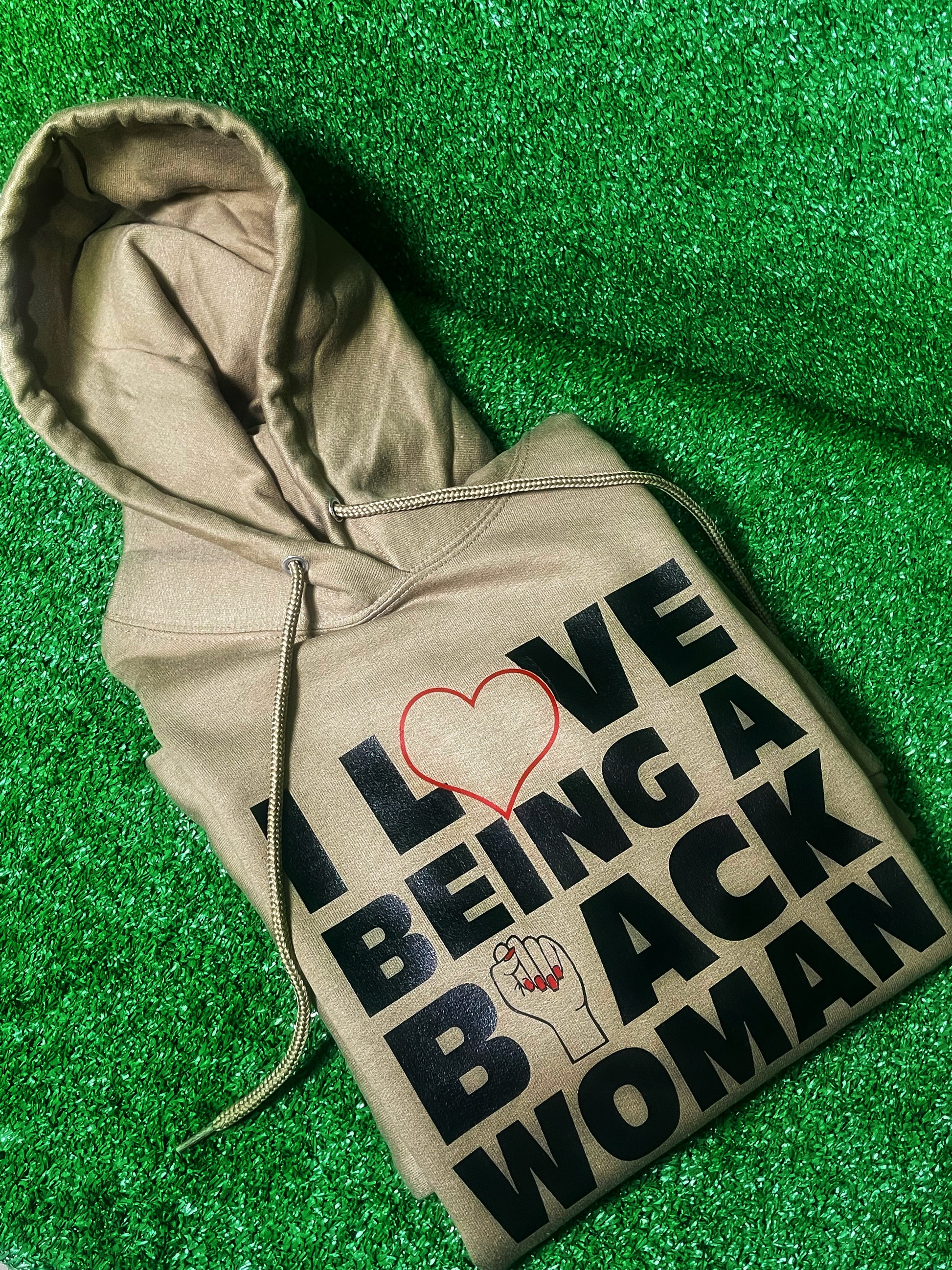 A stylish and comfortable hoodie with the empowering phrase 'I Love Being a Black Woman' boldly printed on the front. Perfect for showcasing pride, confidence, and cultural identity. Ideal for casual wear, this hoodie celebrates black womanhood and is perfect for those who want to make a bold statement. Great for layering in cooler weather, and a must-have for anyone proud of their heritage.