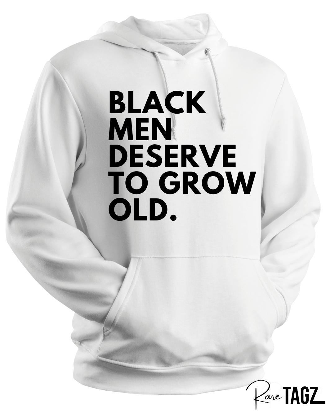 Unisex white hoodie with bold black text reading black men deserve to grow old a powerful statement hoodie for Father's Day or everyday wear to honor Black fathers and men.