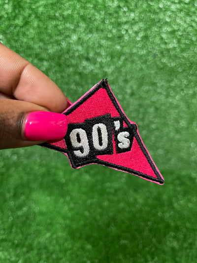 Embroidered iron-on patch featuring a vibrant 90s design.