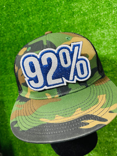 A striking '92%' embroidered iron-on patch celebrating the impactful role of Black women voters in the 2024 election. This patch features vibrant colors and high-quality stitching, designed for easy application on jackets, bags, hats, and other fabric items. Perfect for showcasing pride and support with a bold, empowering statement.