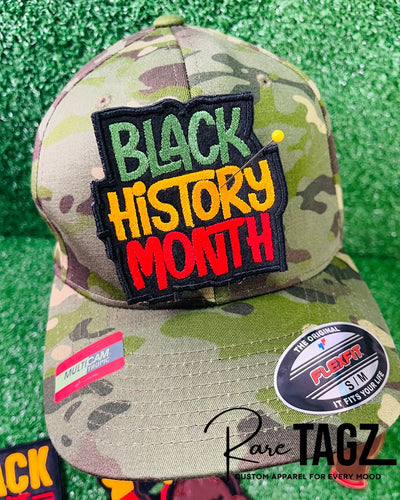 An image of custom Black History Month patches featuring vibrant, bold designs that celebrate Black culture, heritage, and achievements. The patches include empowering phrases, colorful Afrocentric patterns, and symbols of unity and pride. Each patch is intricately embroidered, showcasing high-quality craftsmanship and thoughtful design, perfect for honoring Black History Month on clothing, bags, or accessories.