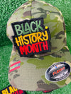 An image of custom Black History Month patches featuring vibrant, bold designs that celebrate Black culture, heritage, and achievements. The patches include empowering phrases, colorful Afrocentric patterns, and symbols of unity and pride. Each patch is intricately embroidered, showcasing high-quality craftsmanship and thoughtful design, perfect for honoring Black History Month on clothing, bags, or accessories.