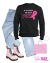 Black sweatshirt with In October We Wear Pink text, perfect for Breast Cancer Awareness. Soft and comfy for everyday wear.