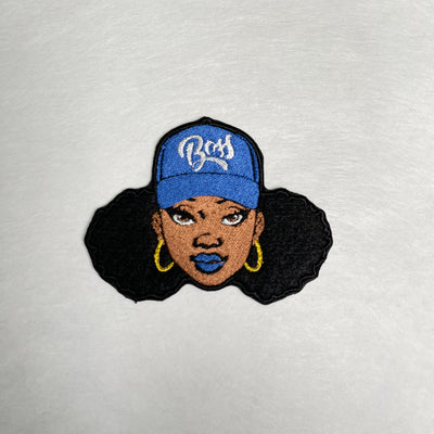 Boss Lady embroidered iron-on patch: A stylish patch with the words Boss.