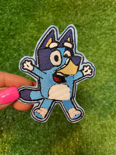 Bluey cartoon character iron-on patch with vibrant colors and playful design.