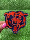 Chicago Bears iron-on patch featuring the team's logo in vibrant colors designed for easy application on clothing or accessories.