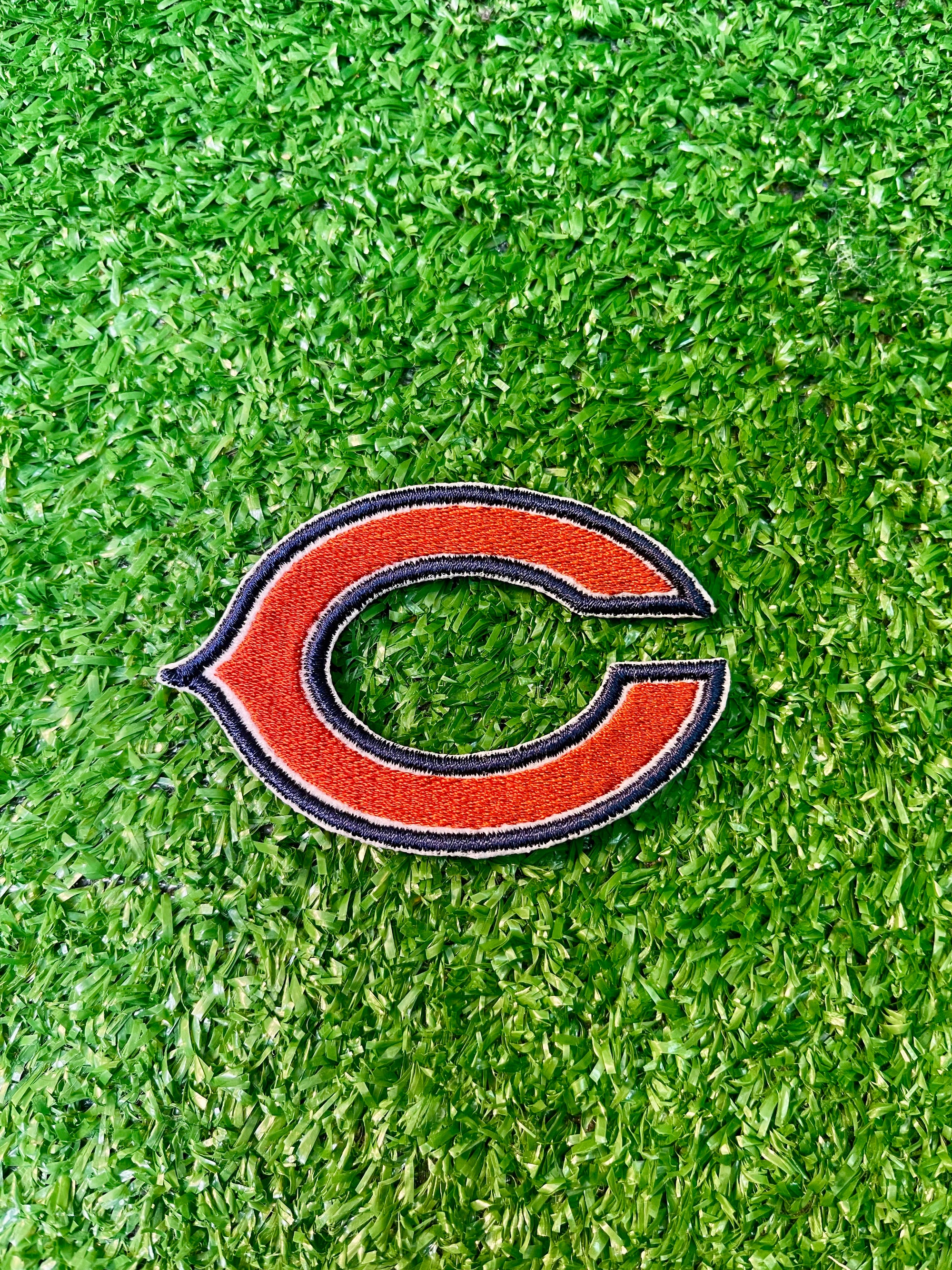 High-quality iron-on patch featuring the iconic Chicago Bears logo, perfect for fans to add a touch of team spirit to jackets, bags, hats, and other clothing items.