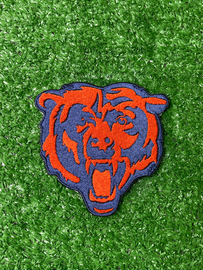 Chicago Bears iron-on patch featuring the team's logo in vibrant colors designed for easy application on clothing or accessories.