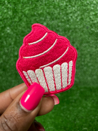 Embroidered iron on patch featuring a colorful cupcake design, perfect for personalizing jackets, bags, or accessories for baking enthusiasts and sweet treat lovers.