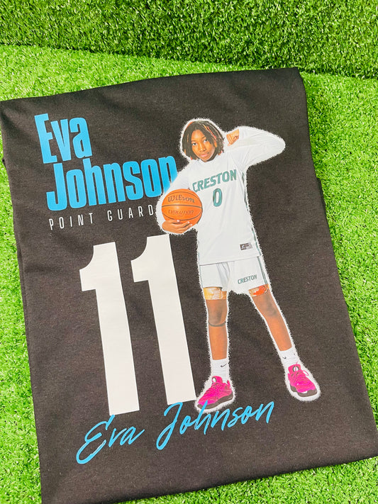 Custom black basketball shirt featuring a young female atahlete in uniform holding a basketball with her name Eva Johnson position, and jersey humber printed in bold graphic text. 