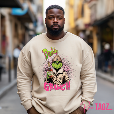 Customizable sweatshirt featuring a playful 'Daddy Grinch' design. The sweatshirt can be personalized with the names of children, making it a unique and festive piece. Perfect for dads looking to celebrate the holiday season with a touch of fun and personalization.