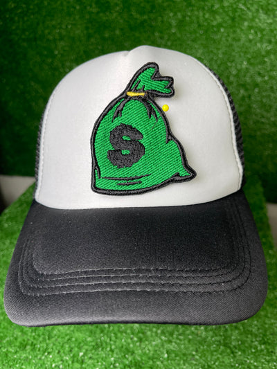 Embroidered patch depicting a money bag with a dollar sign, featuring green, black and gold colors for a bold and eye-catching design.