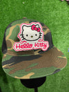 A close up of a Hello Kitty patch featuring the character's signature bow and face, ideal for adding a cute and playful touch to clothing or accessories.