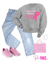 Gray sweatshirt with In October We Wear Pink text, perfect for Breast Cancer Awareness. Soft and comfy for everyday wear.