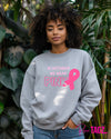 Gray sweatshirt with In October We Wear Pink text, perfect for Breast Cancer Awareness. Soft and comfy for everyday wear.