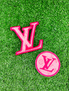 Elegant round applique patch featuring a stylish LV design, perfect for adding a touch of luxury to jackets, bags, hats, and more. Sophisticated patch shaped like the iconic LV letters, ideal for enhancing any garment or accessory with a luxurious, designer flair.