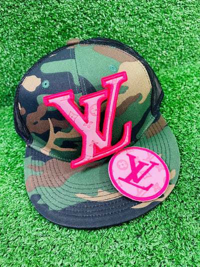 Elegant round applique patch featuring a stylish LV design, perfect for adding a touch of luxury to jackets, bags, hats, and more. Sophisticated patch shaped like the iconic LV letters, ideal for enhancing any garment or accessory with a luxurious, designer flair.