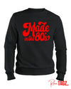 Black sweatshirt with text that says Made in the 80s showcasing a retro design and a comfortable fit.