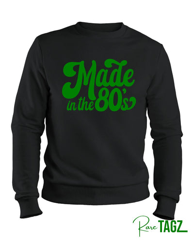 Black sweatshirt with text that says Made in the 80s showcasing a retro design and a comfortable fit.