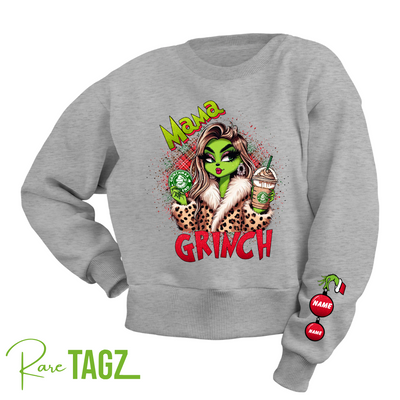 Customizable sweatshirt featuring a playful 'Mama Grinch' design. The sweatshirt can be personalized with the names of kids, making it a unique and festive piece. Perfect for moms looking to celebrate the holiday season with a touch of fun and personalization.