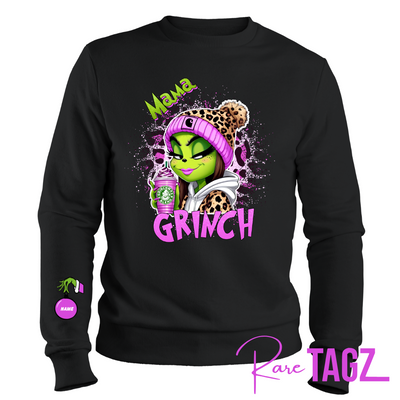 Customizable sweatshirt featuring a playful 'Mama Grinch' design. The sweatshirt can be personalized with the names of kids, making it a unique and festive piece. Perfect for moms looking to celebrate the holiday season with a touch of fun and personalization.