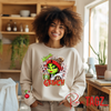 Customizable sweatshirt featuring a playful 'Mama Grinch' design. The sweatshirt can be personalized with the names of kids, making it a unique and festive piece. Perfect for moms looking to celebrate the holiday season with a touch of fun and personalization.