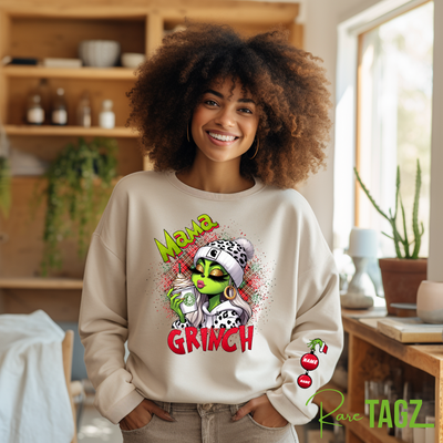 Customizable sweatshirt featuring a playful 'Mama Grinch' design. The sweatshirt can be personalized with the names of kids, making it a unique and festive piece. Perfect for moms looking to celebrate the holiday season with a touch of fun and personalization.