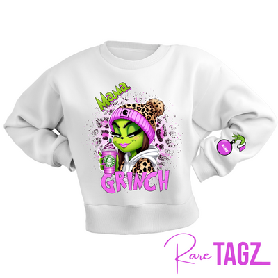 Customizable sweatshirt featuring a playful 'Mama Grinch' design. The sweatshirt can be personalized with the names of kids, making it a unique and festive piece. Perfect for moms looking to celebrate the holiday season with a touch of fun and personalization.