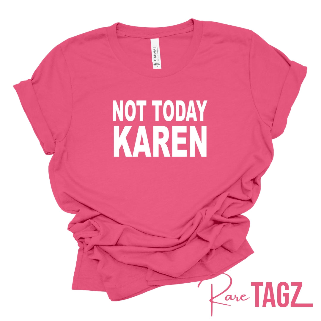 A stylish T-shirt with the bold phrase 'Not Today Karen' printed on the front. Perfect for those who appreciate humor and want to make a statement. Great for casual wear, standing up against negativity, and showcasing your unique style.