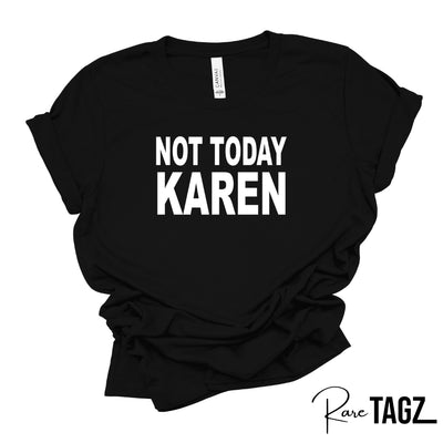 A stylish T-shirt with the bold phrase 'Not Today Karen' printed on the front. Perfect for those who appreciate humor and want to make a statement. Great for casual wear, standing up against negativity, and showcasing your unique style.