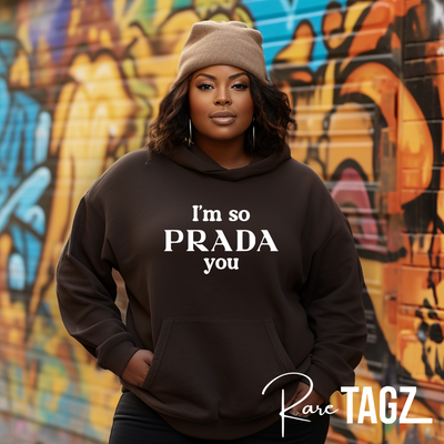 Stylish hoodie featuring the playful phrase 'I'm So Prada You' in elegant lettering. Perfect for adding a touch of fashion-inspired humor to your wardrobe. Ideal for casual wear and making a statement.