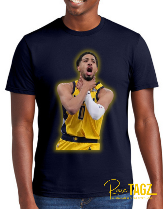 Tyrese Haliburton in a yellow Pacer jersey mid celebration, gripping his neck with both hands in a passionate playoff moment, against a blurred arena crowd. 