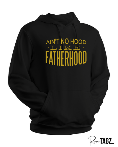 Custom hoodie with the phrase 'Ain't No Hood Like Fatherhood' printed on the front. The design features bold, eye-catching typography, celebrating the unique and rewarding experience of fatherhood. Perfect for dads who want to express their pride and love for their role.