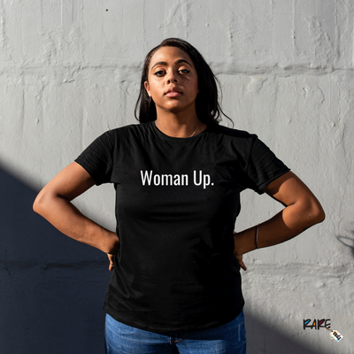 Woman Up T-Shirt. Each shirt features bold white or black lettering, emphasizing empowerment and confidence. Just in time for Women's History Month.